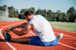 UK Olympics supporting MND | ALS News Today | man stretching before a run