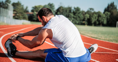 UK Olympics supporting MND | ALS News Today | man stretching before a run