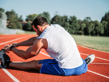UK Olympics supporting MND | ALS News Today | man stretching before a run