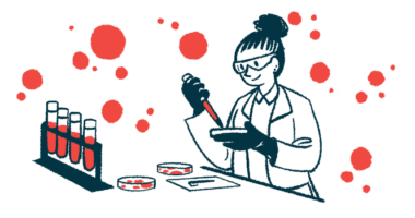 A scientist conducts tests in a lab using petri dishes and vials of blood.