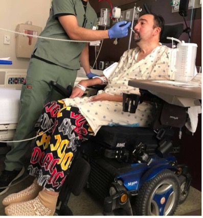 Juan Reyes receiving medical care