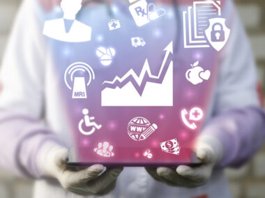 Picture of different facets of disease held by doctor in gloved hands