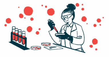 A researcher works in a lab with test tubes and petri dishes.