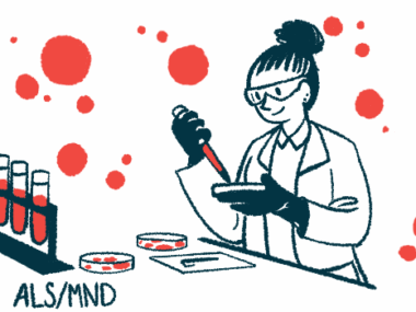 A researcher prepares a petri dish in a lab.