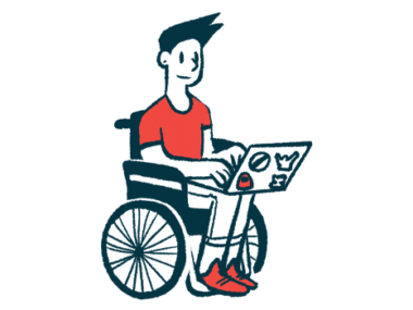A person in a wheelchair types on a laptop.