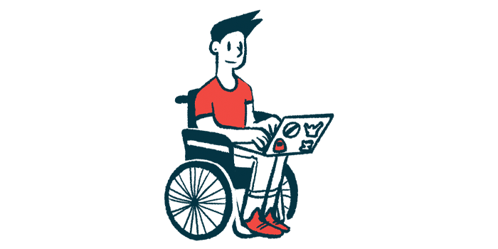A person in a wheelchair types on a laptop.
