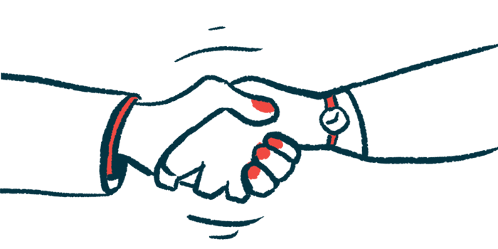 Two hands clasp in a handshake, denoting an agreement.