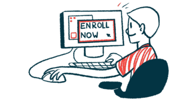 A person sits at a computer with 