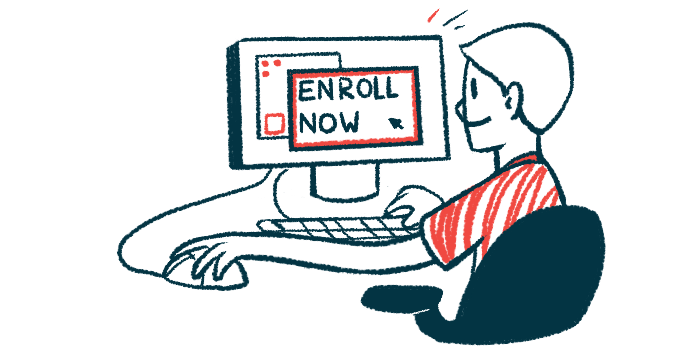 A person sits at a computer with 