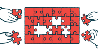 Four hands add pieces to a puzzle.