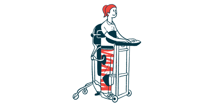 A person stands using an assistive device.
